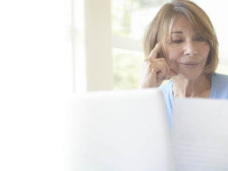 woman reviewing life insurance policy