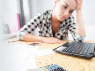 woman stressed about no insurance