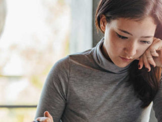 college student reviewing options for insurance