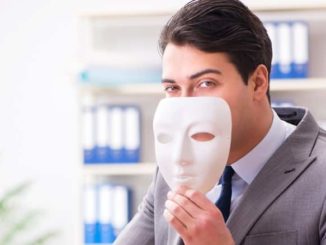 insurance fraud agent at desk