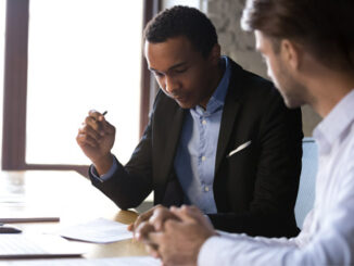 life insurance salesman preparing for client interview