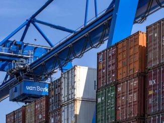 cargo containers stacked - what is cargo insurance article