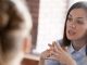 woman discussing what not to say to an insurance adjuster